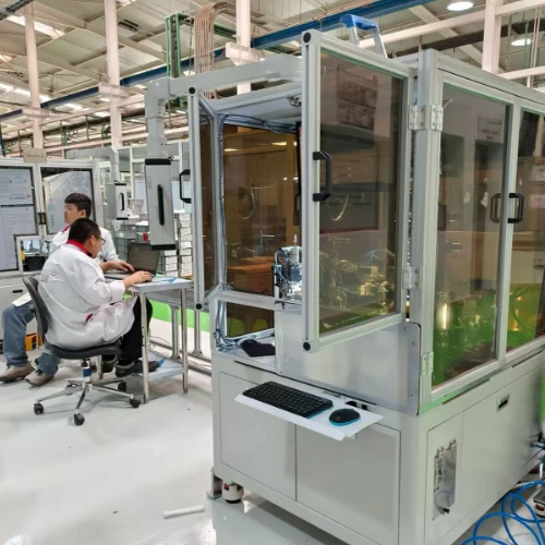 HAIFEI engineer operating an automated welding machine in the factory production line.